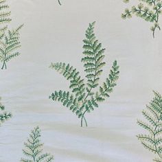 a white background with green leaves on it