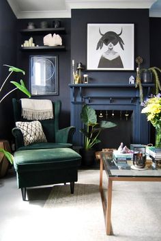 a living room filled with furniture and a fire place in the middle of the room