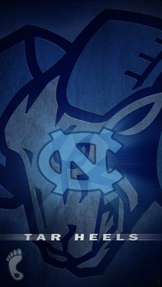 the logo for tar heels is shown in blue and grey colors on a dark background