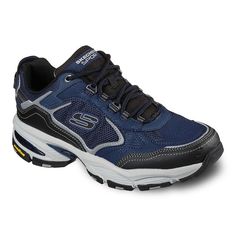 Get even more sporty style and comfort out of these Skechers Vigor 3.0 shoes.Click this FOOTWEAR GUIDE to find the perfect fit and more! SHOE FEATURES Air Cooled Memory Foam full length cushioned comfort insole Shock absorbing supportive midsole Stabilized midfoot Flexible rubber high traction outsole Padded collar and tongue Soft fabric shoe liningSHOE CONSTRUCTION Leather, mesh upper Polyester lining Rubber outsoleSHOE DETAILS Round toe Lace-up closure Memory foam footbed Size: 10.5. Color: Bl Skechers Mens Shoes, Mens Skechers, Mens Walking Shoes, Training Sneakers, Mens Athletic Shoes, Athletic Training, Fabric Shoes, Wide Shoes, Skechers Shoes