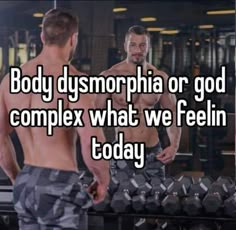 two men standing next to each other in front of a mirror with the words body dys