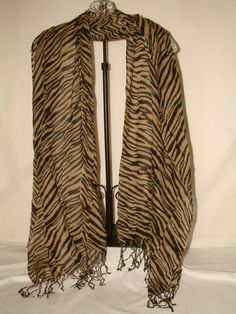 GORGEOUS FASHION SCARF, 25 X 66" LONG, FABULOUS SCARF!!!  NWOT. Special Information Please ask questions before bidding, items are not returnable unless grossly mis-represented. SPECIAL NOTE: With clothing sizes, please use measurements given; manufacturers’ sizes vary a lot, so please check your measurements against those given for the item you are interested in.  Also a few garments are often mis-sized, therefore using your measurements will ensure a proper fit. I measure each garment, so hope One Size Spring Shawl Scarves, Brown Shawl Scarf One Size, One Size Bohemian Acrylic Scarves, Bohemian Acrylic Scarves One Size, Bohemian One Size Acrylic Scarves, Bohemian One-size Acrylic Scarves, Brown Shawl Scarf, Trendy Brown Scarf For Spring, Brown Summer Scarves One Size