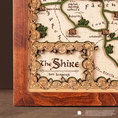 a wooden frame with a map in it