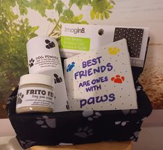 a basket filled with dog treats and personal care items