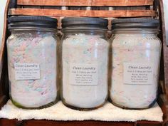 three jars filled with pink and white confetti