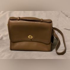 Rare Vtg Nwt Coach “Court” Leather Handbag, “Taupe,” W/Adjustable Strap ***Personally Purchased 10/12/1996, At Coach Warehouse Sale, Reading, Pa, But Never Used It. This Is Not Refurbished! Fs Marking Indicates “Factory Sale/Final Sale” (As Was Told Day Of Purchase). Features Authentic, Genuine Coach Brand “Court” (Style No. 9870) “Taupe” Cross Body Bag Glove-Tanned Leather Unlined Suede Interior Inside Zipper Pocket Front & Back Open Pockets Foldover Flap W/Turnlock Closure Coach Hangtag On Cha Vintage Brown Flap Bag With Top Handle, Vintage Bag With Flap And Detachable Strap, Vintage Beige Shoulder Bag For Office, Classic Coach Flap Bag With Top Handle, Classic Coach Top Handle Flap Bag, Classic Coach Flap Bag For Formal Occasions, Vintage Brown Crossbody Bag For Formal Occasions, Formal Vintage Brown Crossbody Bag, Vintage Satchel Flap Bag With Removable Pouch