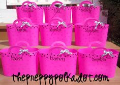 pink plastic bags with black polka dots on them