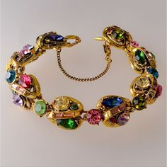 Exquisite Vintage Hollycraft Multi-Color Pastel Rhinestone Bracelet **Will Update With More Info** Elegant Multicolor Crystal Bracelet With Sparkling Stones, Elegant Multicolor Crystal Bracelet, Jeweled Crystal Costume Bracelet, Vintage Multicolor Stone Bracelets, Multicolor Crystal Jewelry With Jubilee Bracelet, Elegant Multicolor Crystal Bracelet With Jewels, Elegant Multicolor Crystal Bracelet With Rhinestones, Elegant Multicolor Crystal Rhinestone Bracelet, Multicolor Crystal Bracelet With Sparkling Stones