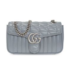 The GG Marmont is characterized by the brand's emblematic monogram hardware and matelassé leather. For The Gucci Aria collection, the style is reimagined with a new geometric approach to the signature material while its Double G hardware is presented with an antique silver-toned finish. The sliding chain strap can be worn as a shoulder strap with 21.6" drop or can be worn as a top handle with 11.8" drop, whatever suits your style! Gucci Quilted Formal Shoulder Bag, Elegant Gucci Bag With Metal Logo, Designer Gucci Quilted Bags, Classic Quilted Gucci Shoulder Bag, Formal Quilted Gucci Bag, Luxury Quilted Gucci Bag, Luxury Gucci Bags With Metal Logo, Gucci Aria, Slouch Bags