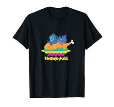 a black t - shirt with an image of two cartoon characters sleeping on top of each other