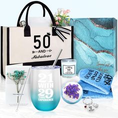 the gift bag is filled with personal items for someone's 50th birthday or anniversary