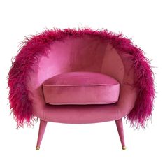 a pink chair with feathers on the armrests and foot rest, sitting in front of a white background