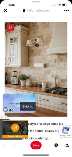 an image of a kitchen with white cabinets and wood counter tops on the phone screen