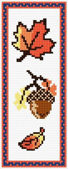 a cross stitch pattern with autumn leaves and acorns on the side, as well as an acorn