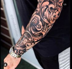 a man with a tattoo on his arm