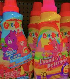 three bottles of care bear laundry deterant on the shelf