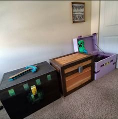 two toy chests sitting next to each other on the floor