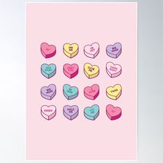 heart shaped candies arranged in different colors on a pink background with the words i love you