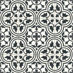 a black and white tile pattern with circles