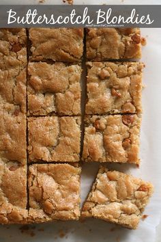 butterscotch blondies cut into squares on a white surface