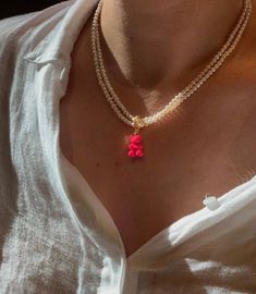 Descriptions: Faux Pearl Double Strap Necklace with cute gummy bear charm! Cute Gummy Bear, Gummy Bear Necklace, Necklaces Ideas, Stone Jewellery, Red Tigers Eye, Bear Necklace, Rose Gold Watches, Luxury Diamonds, Necklace Ideas