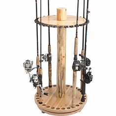 a wooden stand with fishing rods and reels on it