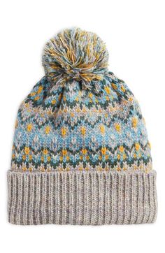 A colorful pom tops this cozy beanie that gets seasonal flair from a classic Fair Isle pattern. 44% acrylic, 43% nylon, 13% polyester Hand wash, dry flat Imported Fair Isle Beanie, Flat Top Hats, Free People Hat, Cozy Beanie, Sage Color, Women's Headwear, Grey Beanie, Fair Isle Pattern, Fabric Gift Bags