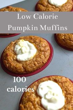 low calorie pumpkin muffins with white icing in a muffin tin