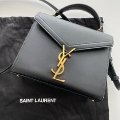 Authentic. Black Saint Laurent Cassandra Mini. Great Condition. Includes Dust Bag. Ysl Cassandra Mini, Ysl Cassandra, Saint Laurent Bags, Yves Saint Laurent Bags, Bags Black, Yves Saint Laurent, Saint Laurent, Dust Bag, Bag Lady