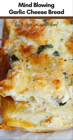 a close up of a piece of bread with cheese and spinach on it in a white plate