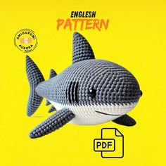 an origami shark is shown in front of a yellow background with the words english pattern below it