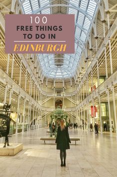 a woman standing in the middle of a building with text overlay reading 100 free things to do in edinburgh