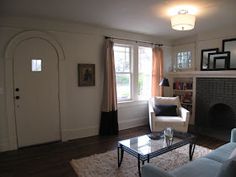 the living room is clean and ready for us to use in its new owner's home