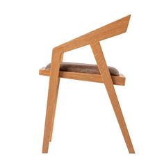 a wooden chair with a cushion on it's seat and the back rest folded down