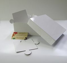 a white box with a piece of puzzle in it