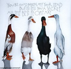 three ducks standing next to each other on top of a white sheet with words written in it