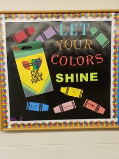 a bulletin board that says let your colors shine on the chalkboard with crayons