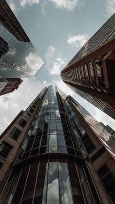 looking up at tall buildings from the ground