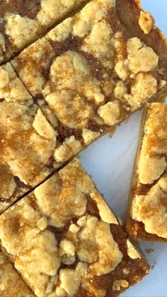 several pieces of cake sitting on top of a white plate