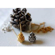 Our baby pine cone necklace is just the cutest accessory and would make the perfect seasonal gift.  Inspired by my walks in the forest with my dog, this cute pine cone pendant necklace is sure to become your new favourite.Pine cone necklace has a jump ring soldered onto the back of the pendant, making it appear to be floating on the delicate curb chain.Made from 100% recycled sterling silver, which is then oxidised and polished to bring out the detailing.Handmade in Hatton Garden, London. Baby p Pine Cone Pendant, Pine Cone Necklace, Cherry Blossom Ring, Pinecone Necklace, Floral Wedding Bands, Winter Necklace, Pinecone Pendant, Alternative Wedding Rings, Pendant Making