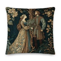 a decorative pillow with an image of a man and woman in medieval dress standing next to each other