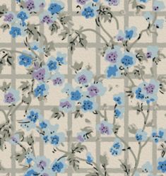 a blue and purple flowered pattern on a white background with grey squares in the center