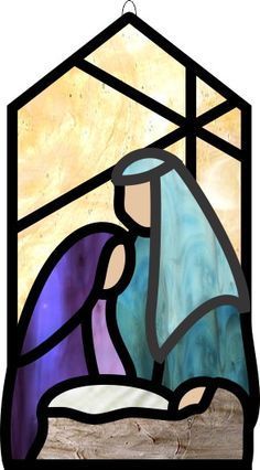 a stained glass nativity scene depicting the birth of jesus, in blue and purple colors