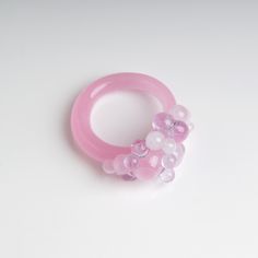 This Pink cocktail ring is made of glass in the lampwork technique. This magnificent glass ring can be a shining addition to your outfit or simply a unique note, matching your mood and individuality! 💕 You will definitely look stunning with this cluster statement ring! Dimentions: Check the drop down menu to see what sizes are available. If the size you need is not available, feel free to contact me and I will make the ring you need. 🎁 This chunky cocktail ring will also be a great gift for bi Elegant Handmade Pink Crystal Ring, Party Resin Ring Jewelry, Handmade Pink Party Rings, Modern Pink Jewelry For Party, Handmade Pink Resin Rings, Modern Pink Party Jewelry, Pink Resin Ring Jewelry, Pink Round Glass Jewelry, Pink Glass Round Jewelry