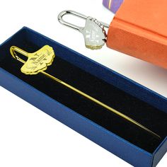 a golden key is in a blue box