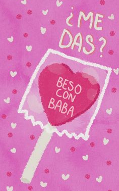 a candy lollipop with the words beso con baba written on it