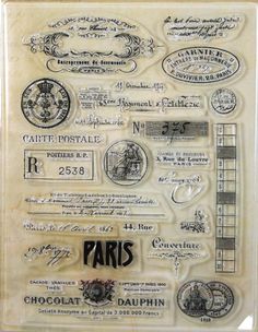 a stamp set with stamps on it that says paris and other things in the background