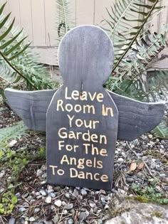 a garden marker with words written on it