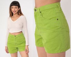 "Vintage 90s denim shorts in lime green denim with a high waist and a five pocket design. Please see measurements and condition below. Every garment we sell is authentic vintage! You will receive the exact item photographed. Condition: Very good vintage with light general wear. Best fits women's: Labelled size 10, but runs modern 8. See measurements.   Tag: Geoffrey Beene Material:  Cotton MEASUREMENTS Taken from seam to seam while the garment is lying flat. Double the armpit, waist, and hips Fo 90s Style Fitted Green Bottoms, Fitted Green Jean Shorts For Summer, Fitted Green Jean Shorts For Spring, Fitted Green Jean Shorts, Green Cotton Jean Shorts, Vintage Green Cotton Shorts, Vintage Green Bottoms With Built-in Shorts, 90s Style Green Cotton Bottoms, Green 90s Style Cotton Bottoms