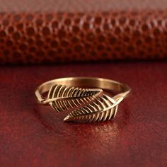 Brass Gold  Adjustable Leaf Vine Ring, Open Spiral Shape, Simple Minimalist Design, Elegant  Everyday Jewellery, Ring Stack, Gift for Her, Welcome to My shop! We provide the Excellent quality Jewelry to our Customers. Customer satisfaction is our first priority. All sizes are available for any query contact us. Handmade Items PRODUCT              :-  Ring Material                :- Brass or sterling Silver 925       We have Brass rings in all size for both men and women. We always use precious and semi precious gemstone for making jewelry.If you have any design in your mind so please let us know we will try our best to made it( For customization Making charges will apply). we give fast delivery service . If you have any questions or problem please contact us :- ♥Thank you for Visiting my s Latest Ring Designs Gold For Women, Latest Ring Designs, Leaf Rings, Nontraditional Engagement Rings, Silver Leaf Ring, Gold Finger Rings, Ring Pattern, Vine Ring, Gold Jewelry Outfits